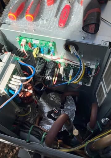 Replacing the power board on an inverter heat pump